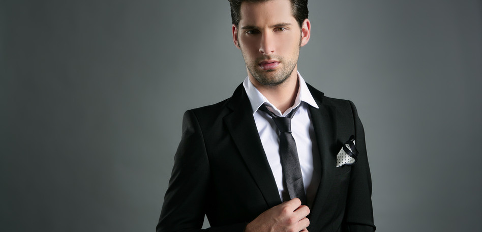 Fashion young businessman black suit casual tie